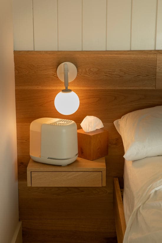 Canopy humidifier on nightstand