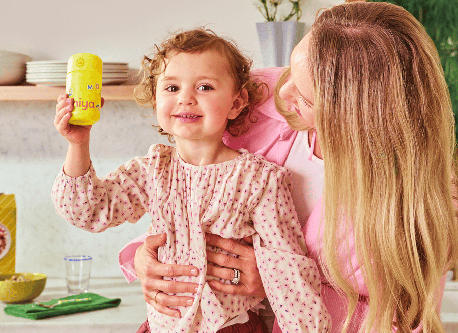 Mother and child with Hiya vitamins