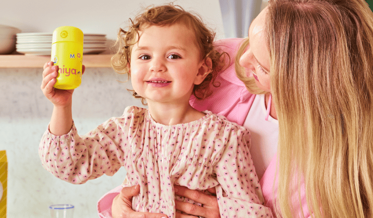 Mother and child with Hiya vitamins