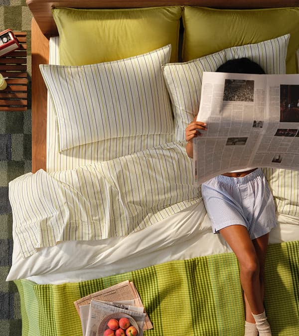 Made bed with crisp white sheets