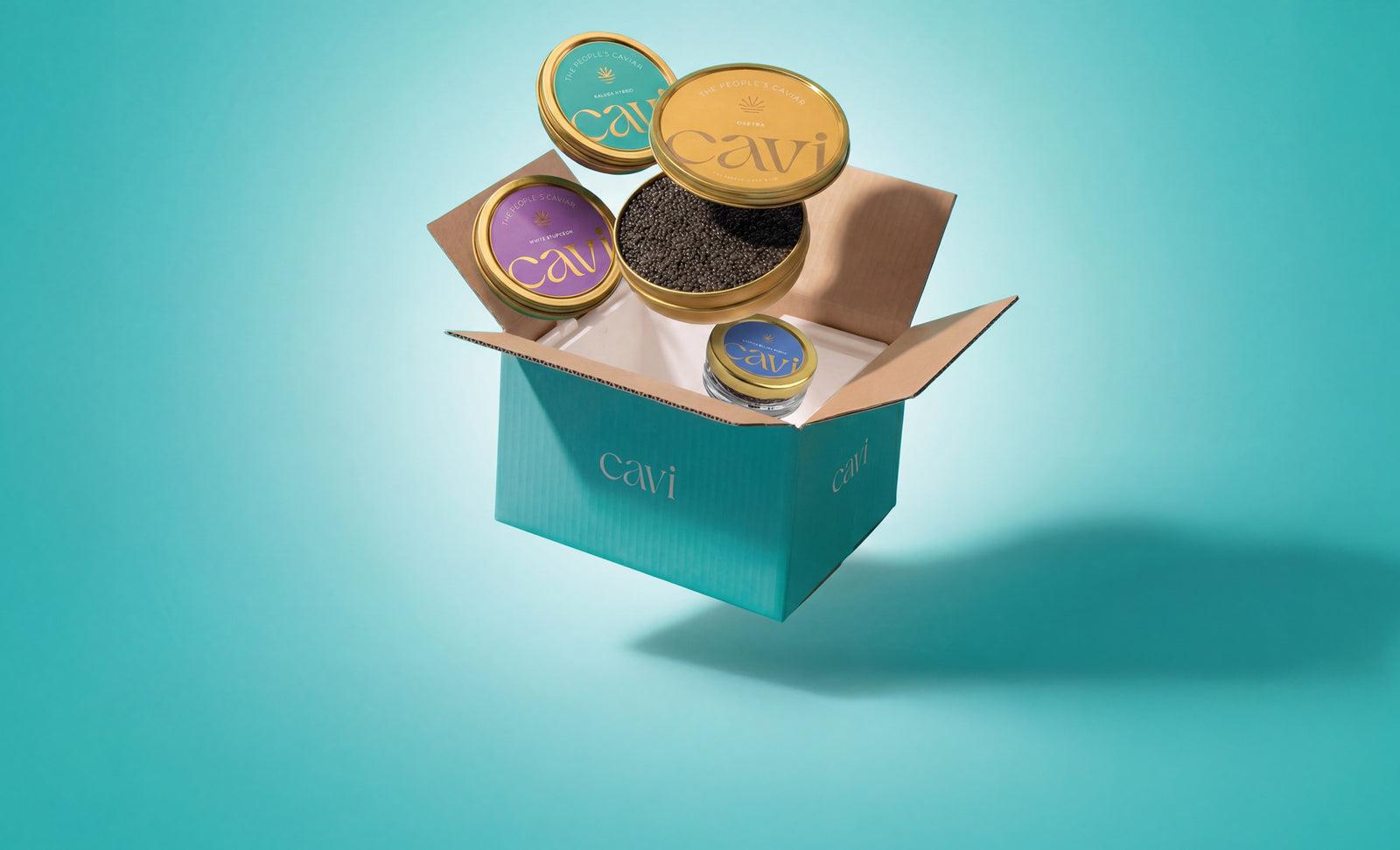 A CAVI box packed with caviar tins