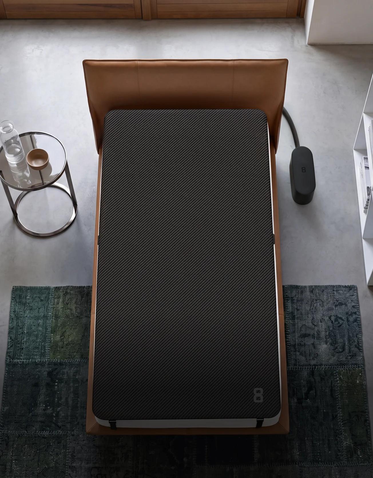 A Pod Cover on a twin bed in a small bedroom