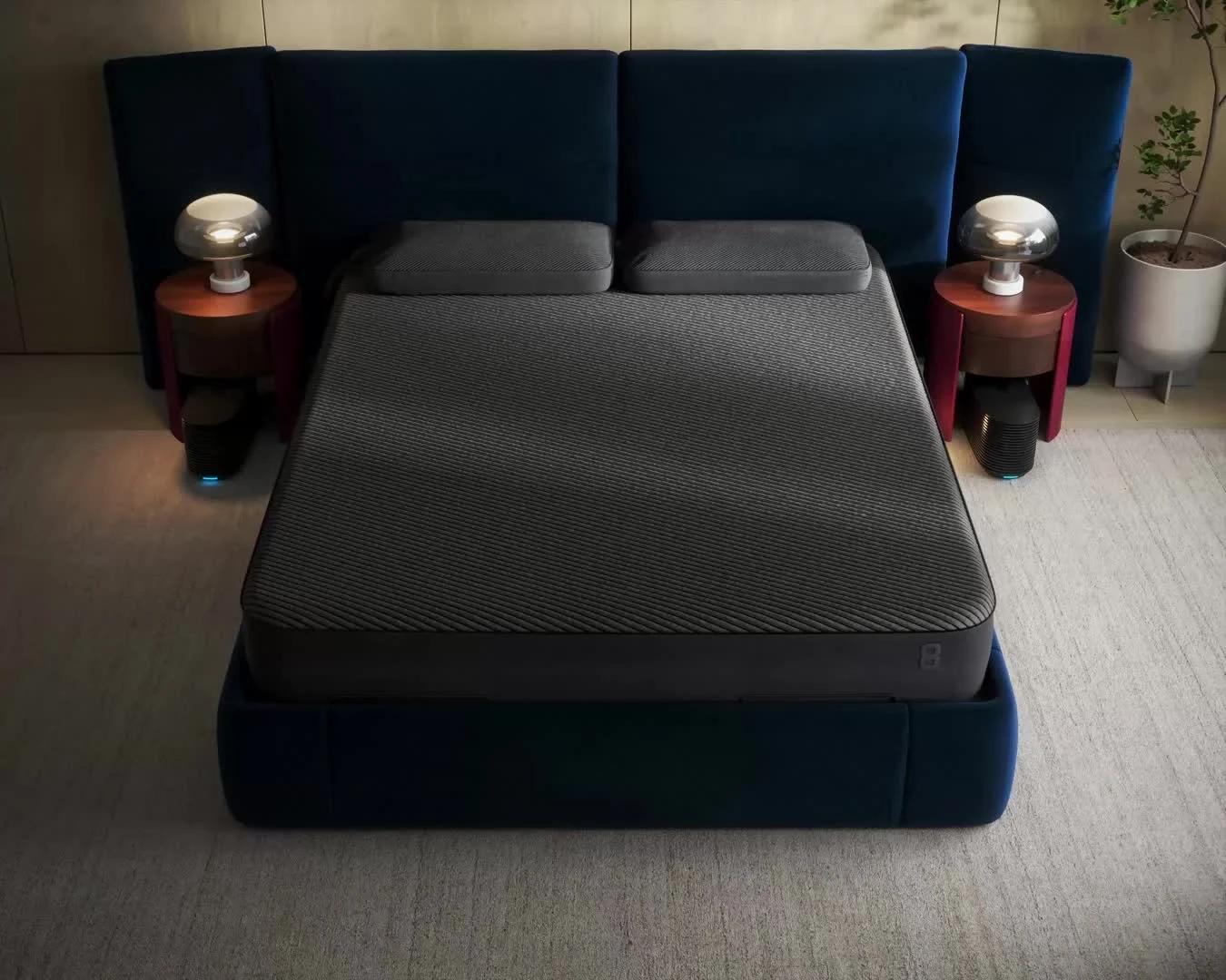 Bed made up with Blanket on it, temperature cards indicating different temperature on Pillow vs. bed