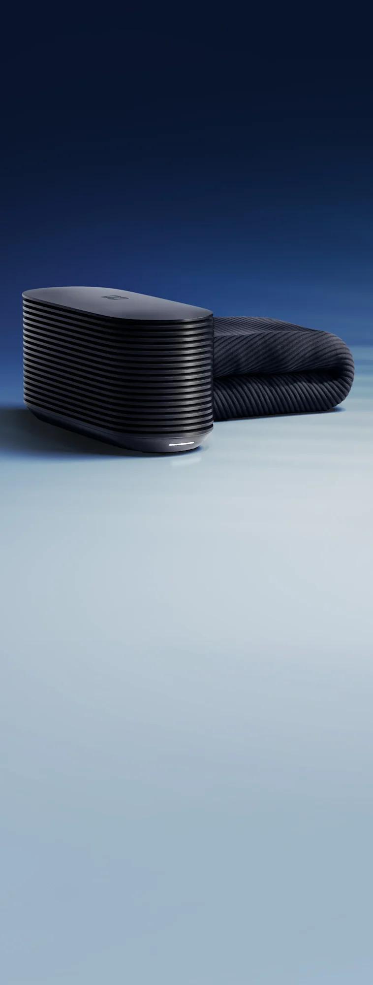 The Pod 6 Hub beside a folded Cover, against a blue sky