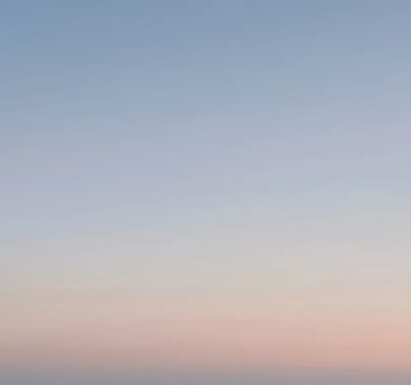 A soft blur of dawn light