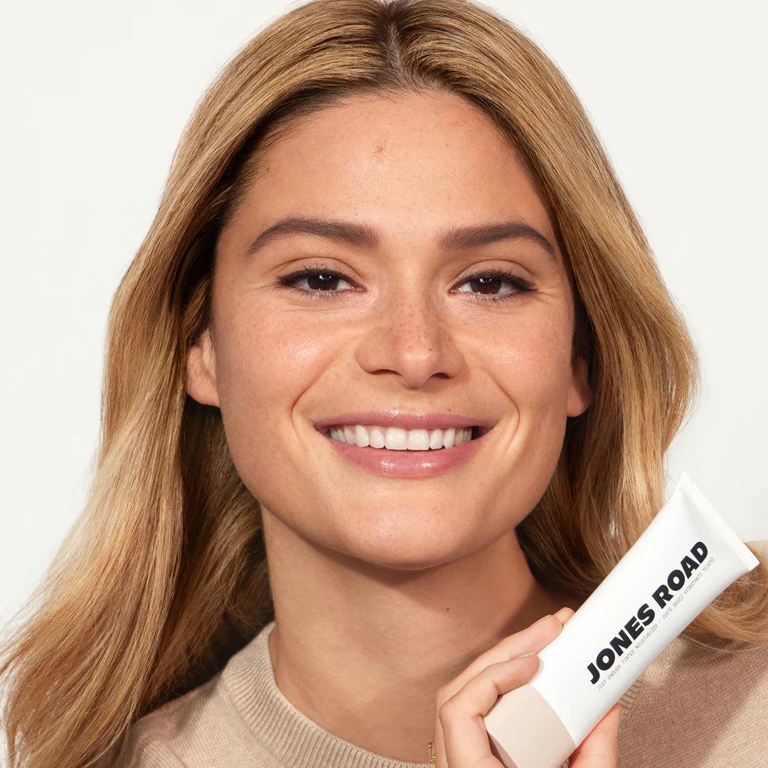 Model wearing Just Enough Tinted Moisturizer