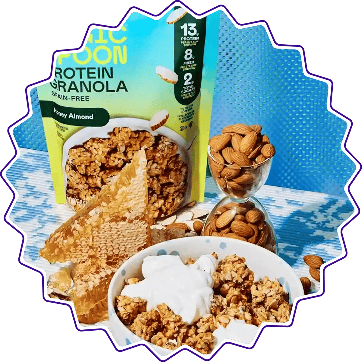 Bag of Magic Spoon Honey Almond Protein Granola with almonds, honeycomb and a bowl of granola and yogurt