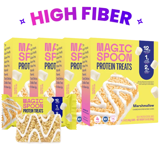 Boxes of Magic Spoon Marshmallow Protein Treats with an unwrapped treat