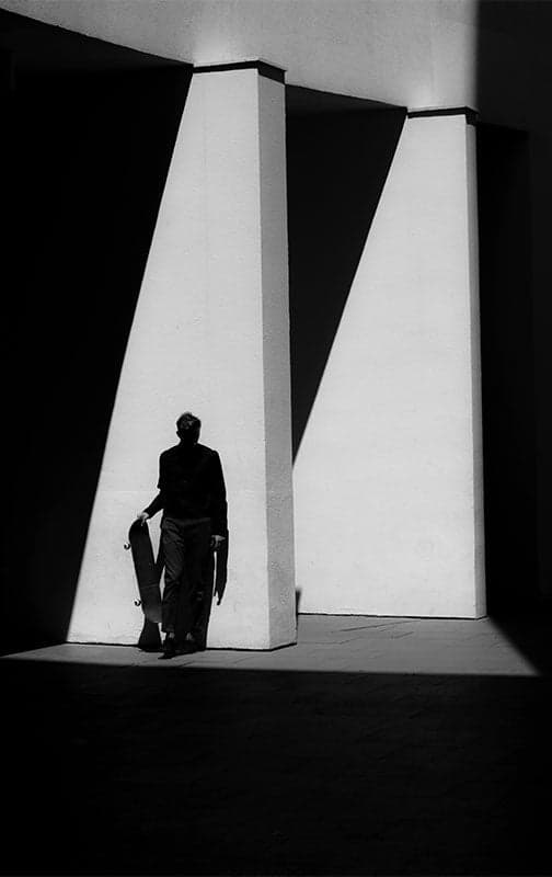 Framed silhouette photograph in dramatic light