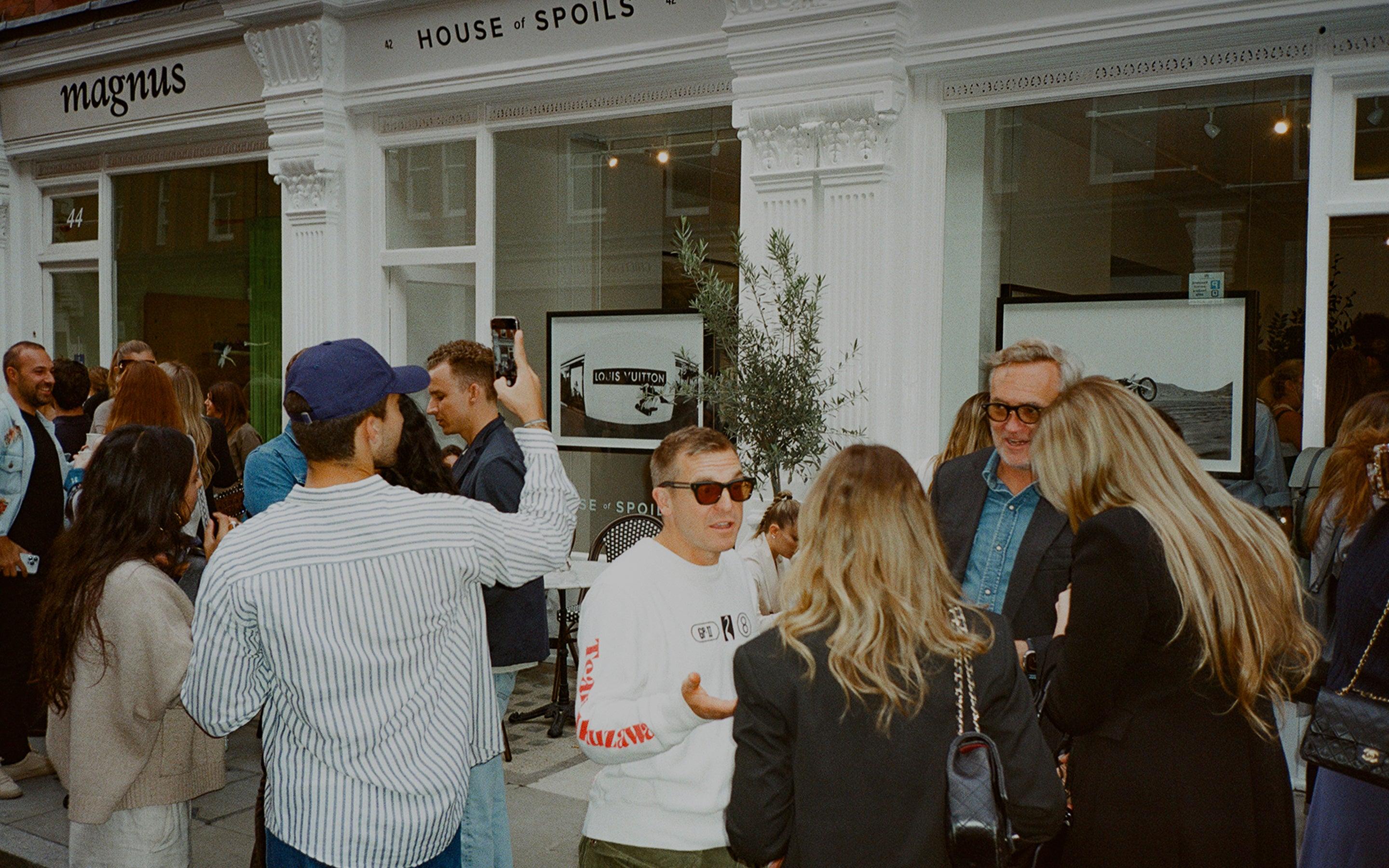 Crowd gathered outside the House of Spoils gallery storefront