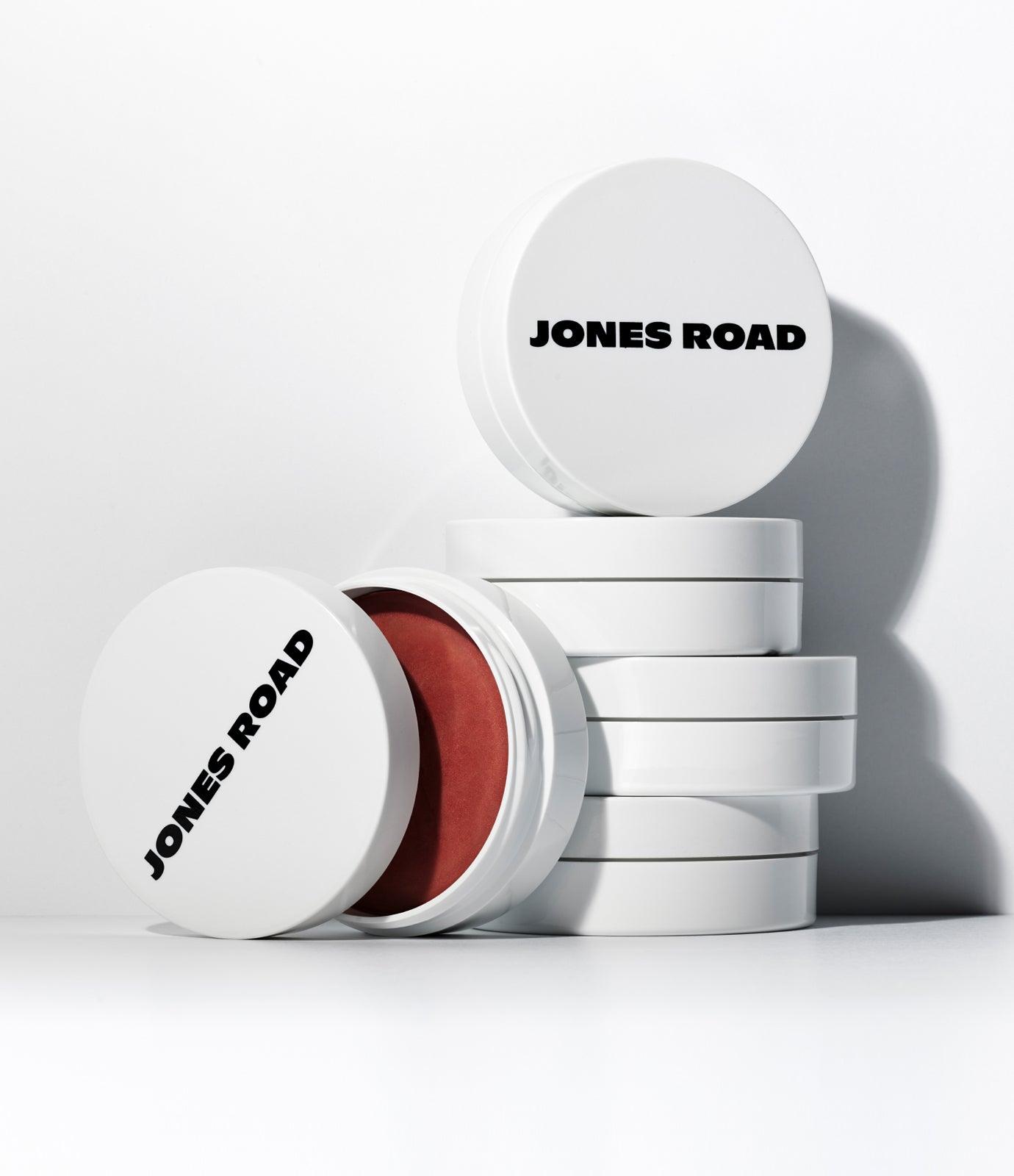 Jones Road clean makeup product containers stacked