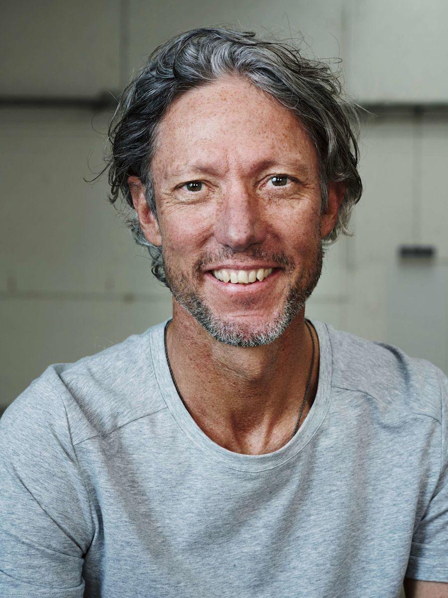 Portrait of On Co-Founder Olivier Bernhard in a gray t-shirt.