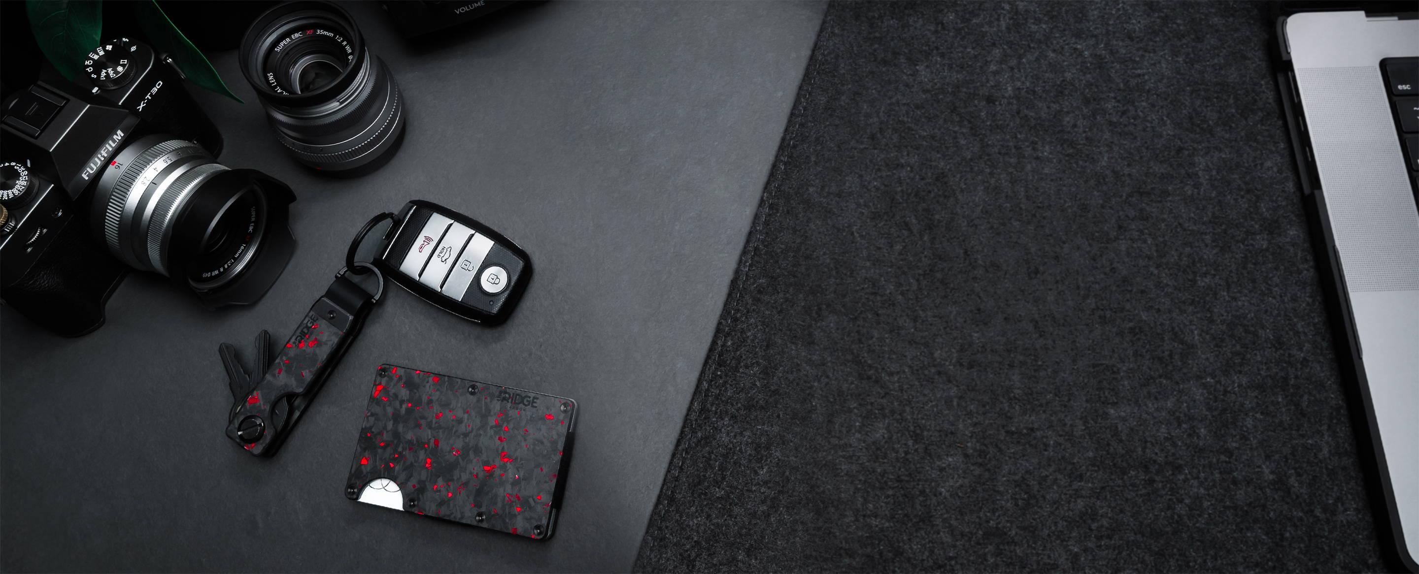 Everyday carry gear laid out on a dark surface
