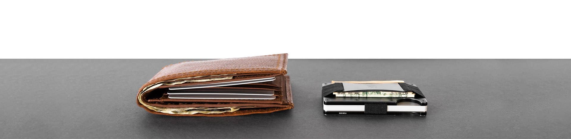 A traditional bulky wallet next to the slim Ridge wallet